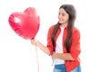 Young teenager child girl with heart shape balloon. Happy Valentines Day. Love and pleasant feelings concept. Portrait Royalty Free Stock Photo