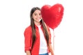 Young teenager child girl with heart shape balloon. Happy Valentines Day. Love and pleasant feelings concept. Portrait Royalty Free Stock Photo