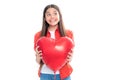 Young teenager child girl with heart shape. Happy Valentines Day. Love and pleasant feelings concept. Portrait of Royalty Free Stock Photo