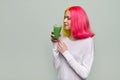 Young teenager girl with green vegetable smoothie drink, healthy vegan diet, copy space Royalty Free Stock Photo