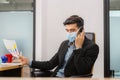 Young telephone operator with headset wear protection face mask against coronavirus, Customer service executive team working at