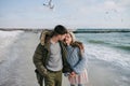 young tender couple hugging on winter sea Royalty Free Stock Photo