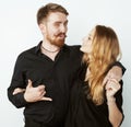 Young tender couple, man and woman in love isolated on white close up kissing smiling fooling around Royalty Free Stock Photo