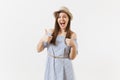 Young tender elegant charming woman dressed blue dress, hat showing thumbs up gesture, posing isolated on white