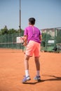 Young tennis player prepares for receiving the servis. High concentration. Royalty Free Stock Photo