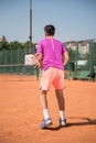 Young tennis player prepares for receiving the servis. High concentration. Royalty Free Stock Photo