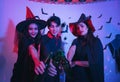 Young Thai People in Costumes Celebrating Halloween. Group of Young Happy Friends Wearing Halloween Costumes having Fun at Party Royalty Free Stock Photo