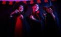 Young Thai People in Costumes Celebrating Halloween. Group of Young Happy Friends Wearing Halloween Costumes having Fun at Party Royalty Free Stock Photo