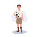 Young Thai Student Boy Playing Football After School. Boy with football