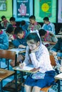 Young Thai students sitting for an English exam