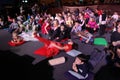 Young theatergoers. children enthusiastically watching children's Christmas puppet show theatre Smeshariki.