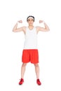 Young thin man in sportswear showing muscles