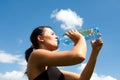 Young thirsty girl drinking water Royalty Free Stock Photo