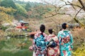 Young three girl wearing Japan kimono standing in front of Daigoji Temple in Kyoto, Japan.