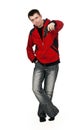 Young thug in a red sweater with a gun Royalty Free Stock Photo