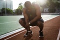 Young tired african male athlete finished running Royalty Free Stock Photo