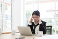 Young Tired Business. Woman frustrated at work. Feels stressed at work. Royalty Free Stock Photo