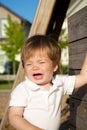 Young toddler crying at the park Royalty Free Stock Photo