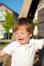 Young toddler crying at the park Royalty Free Stock Photo