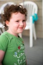 Young toddler girl on patio deck outside at sunset down at shore