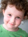 Young toddler girl on patio deck outside at sunset down at shore