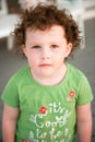 Young toddler girl on patio deck outside at sunset down at shore