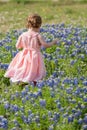 Young Girl in Field of Blue Bonnet Flowers Royalty Free Stock Photo