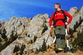 Young tourist admiring the view in Ciucas mountains, Romania Royalty Free Stock Photo