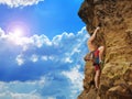 Young tourist climbing