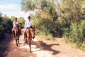 Young Tourist Couple Horseback Riding Royalty Free Stock Photo