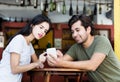 Young tourist couple posting picture from vacation