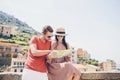 Young tourist couple traveling on holidays outdoors in italian vacation.