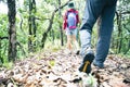 Young tourist couple walking spectacular mountain scenery in high mountains. man and woman hiker on top rock. A couple of Royalty Free Stock Photo