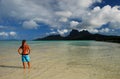 Young tourist girl. Bora Bora, French Polynesia Royalty Free Stock Photo