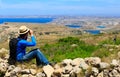 Young tourist hiking in scenic nature