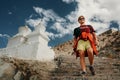 Young tourist man visit the tibetian holy places in Himalaya mountain