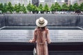 Young tourist at the 9/11 Memorial in New York