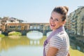 Young tourist standing on the bridge overlooking Ponte Vecchio Royalty Free Stock Photo