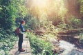 Young tourist woman hiking and backpacker at Forest Travel concept Royalty Free Stock Photo