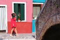 Young Tourist Woman In Old Italian colorful Town