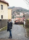 Young tourist woman posing in historical street in Banska Stiavnica Royalty Free Stock Photo