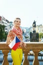 Young tourist woman in Prague Czech Republic with Czech flag Royalty Free Stock Photo