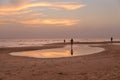 Young tourists enjoying on sandy Hikkaduwa beach