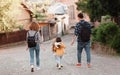 Young tourists family with their two lovely daughters walking Royalty Free Stock Photo