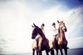 Young Tourist Couple Horseback Riding Royalty Free Stock Photo