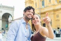 Young Tourists in Munich in front of church