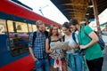 Young tourists travelling by train