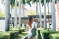 Young traveler asian woman admiring beautiful sunny narrow streets in Bangkok, Thailand. Sunny day in Bangkok, traveling in Asia. Royalty Free Stock Photo