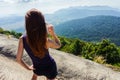 Young traveler girl stand on the top of mountain Royalty Free Stock Photo