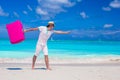 Young traveler with his luggage on a tropical beach Royalty Free Stock Photo